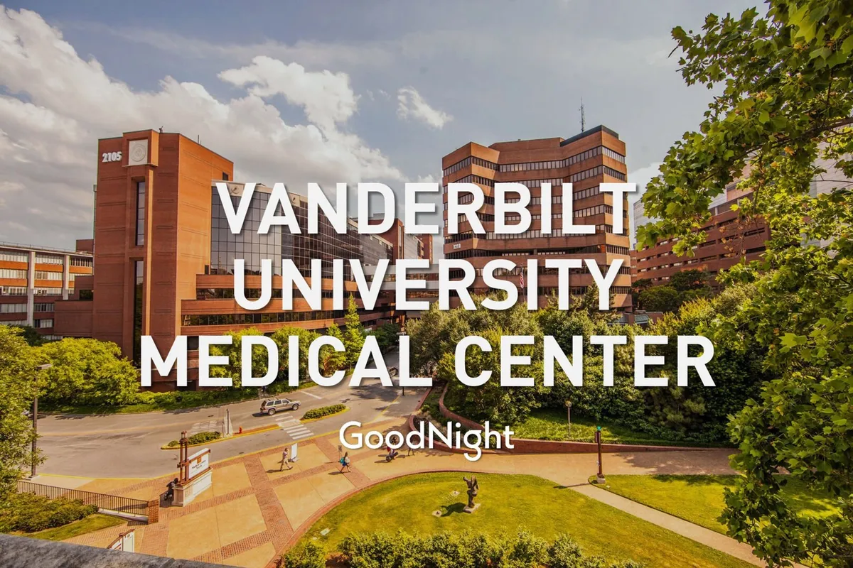 Featuring the stately exterior of Vanderbilt University Medical Center with clear signage and manicured landscaping, this image demonstrates easy access to major medical and research facilities, an important detail for business and conference guests.