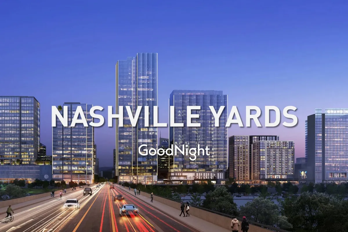 A striking evening skyline of downtown Nashville with modern skyscrapers aglow, a bridge, and city lights. The ambiance suggests a lively, urban environment and convenient access to business meetings, networking events, and post-conference leisure.