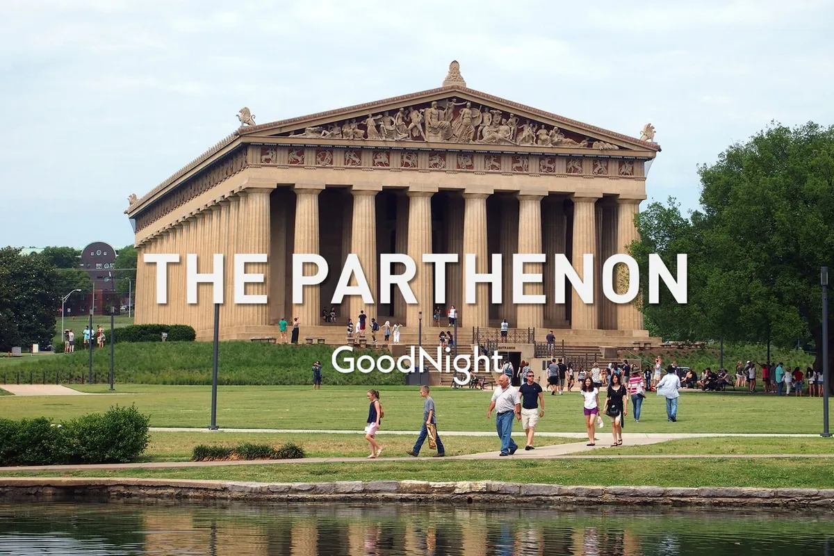 The image captures the iconic Parthenon structure set within Centennial Park, surrounded by lush green lawns and visitors enjoying a sunny day. The classical architecture stands out as a major Nashville landmark, with people walking and relaxing in the scene.